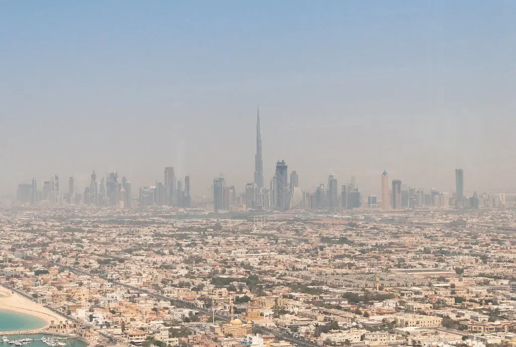 Aerial view of Dubai with Burj Khalifa in the distance